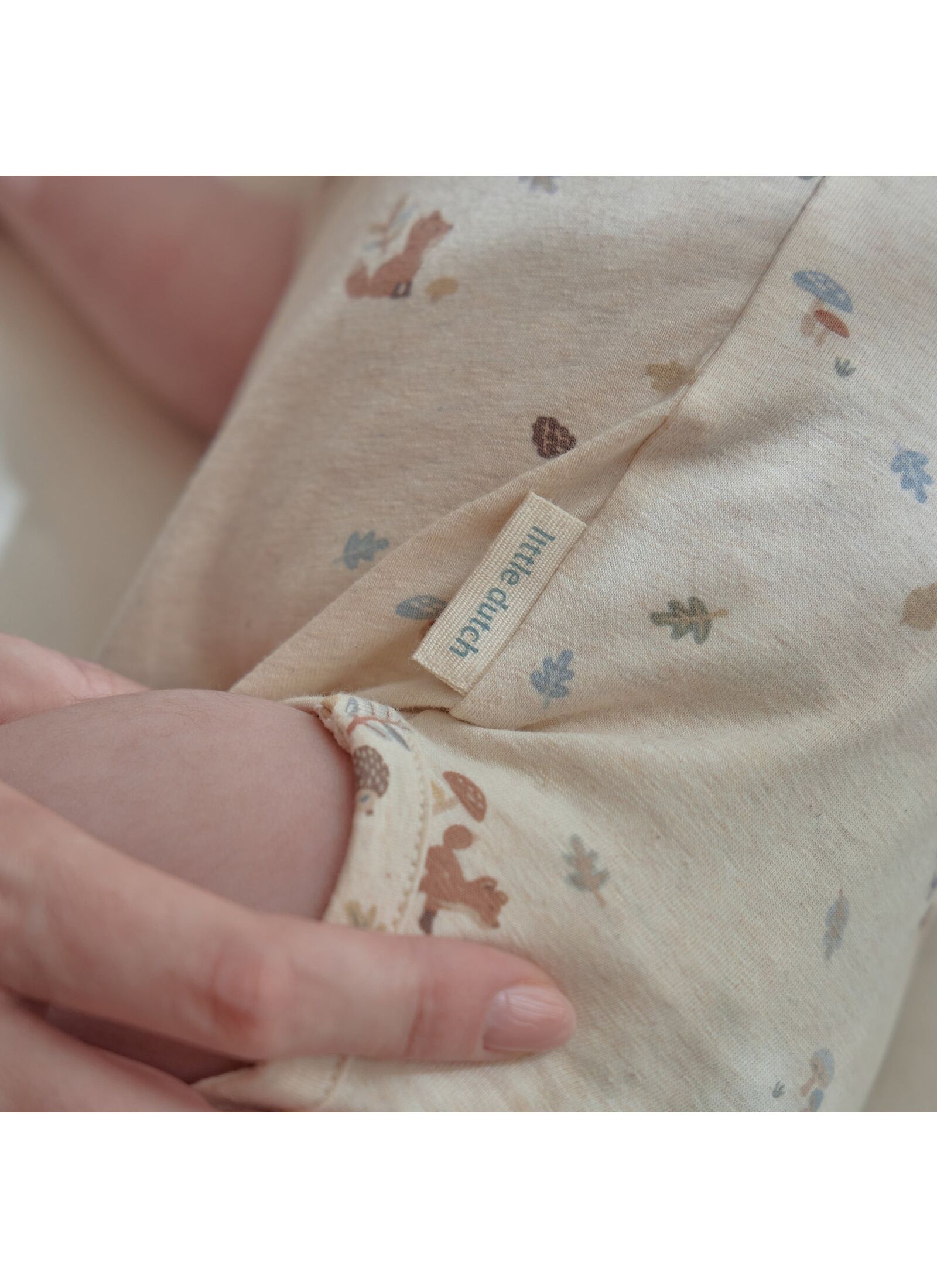 ORGANIC COTTON BODYSUIT SAND MELEE