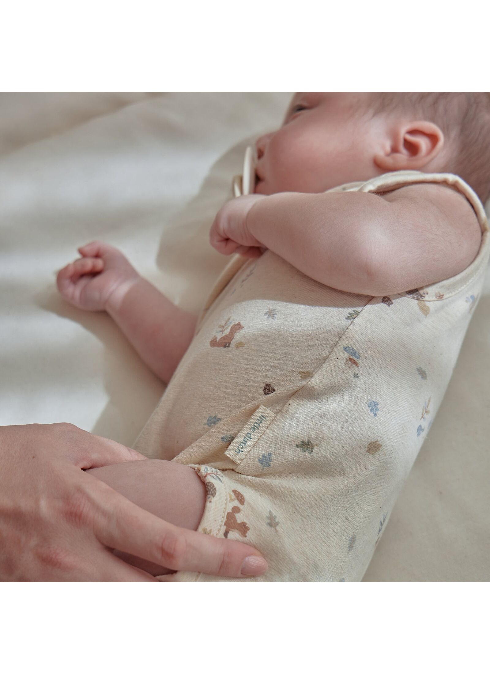 ORGANIC COTTON BODYSUIT SAND MELEE